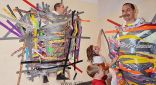 صور: مدير مدرسة امريكية يسمح لطلابه بتعليقه على الحائط تنفيذا لوعده